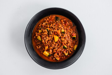 plant-based lentil soy protein ragout bolognese sauce with zucchini