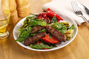 Salad with grilled beef steak
