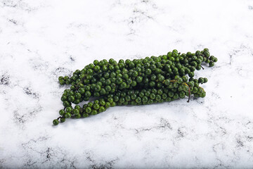 Fresh ripe green peppercon heap