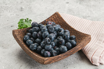 Sweet ripe blueberry on the bowl