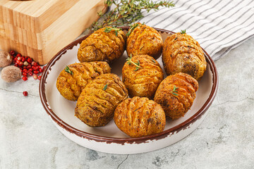 Baked baby potato with thyme