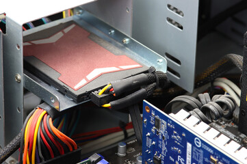 Testing and repair of a computer server. On a metal panel. Close-up. Soft focus.