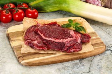 Raw beef cheeks cut for cooking