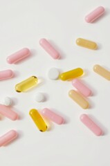 Assorted Dietary Supplements and Multivitamins on a White Background