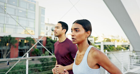 Interracial couple, runner and fitness in city for workout, exercise or training together in urban town. Man, woman and athlete with cardio, sports or marathon for endurance and health or wellness