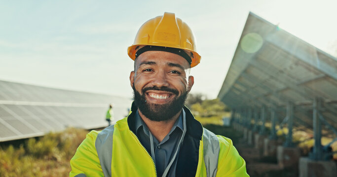 Man, portrait and engineer at solar farm, energy saving and supervisor for panel maintenance. Male person, renewable power supply and outdoor for ecology inspection, safety helmet and grid field
