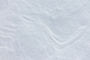 The snow is white and the ground is covered in it