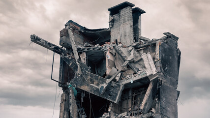 Fototapeta premium destroyed and burned houses in the city in Ukraine