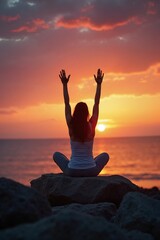 Woman embracing sunset on rocks, spiritual awakening