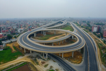 Naklejka premium highway with a large round curve in the middle. The road is empty and there are no cars on it