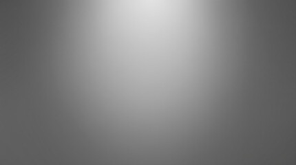 Minimalistic gray gradient background with subtle light effect.