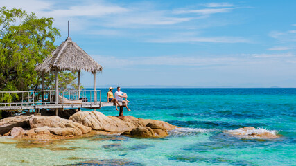 Relaxing moments by the turquoise waters of Koh Munnork Island, Rayong, Thailand