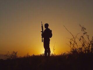 silhouette of a soldier at sunset