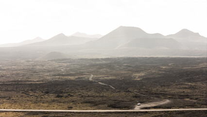 Endless desert landscape with mountains in a remote area in Lanzarote