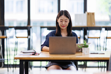 Fototapeta premium Business asian man working at office with documents on his desk, doing planning analyzing the financial report, business plan investment, finance analysis concept 