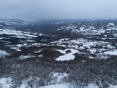 Snow covering the tuscan-emilian apennines near bore in italy during winter