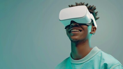 A young man wearing opaque virtual reality goggles, with a look of joy