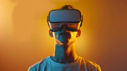 A young man wearing opaque virtual reality goggles, with a cheerful expression