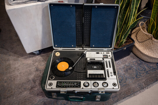 Detail of an old portable sound system in a suitcase, it is the Sunny-Vox no. 6000Vinatge music center with radio, cassette and turntable