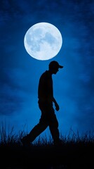 Obraz premium Silhouette of a walking man against a blue sky and moon