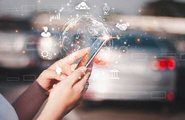 Hands holding a smartphone displaying a glowing digital globe with futuristic business icons overlayed, representing global connectivity.