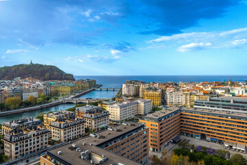 Obraz premium Aerial view of the Urumea river and the bridges of San Sebastian, Donostia at sunset, Basque Country