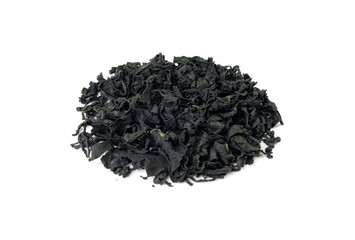 Wakame seaweed pieces isolated, edible raw algae, dry undaria pinnatifida healthy food kelp