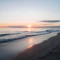 Golden Sunrise Over a Calm Ocean with Gentle Waves and Footprints