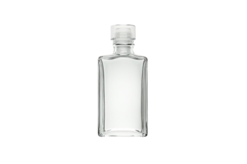 Clear glass bottle placed on a white surface demonstrating minimalistic design and simplicity in packaging