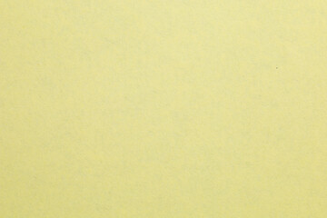 A yellow background with a white line, textured origami paper backdrop