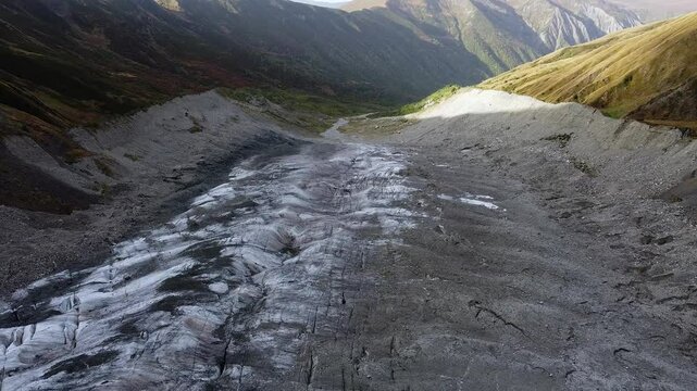 Flyover terminus of Adishi Glacier and valley moraine in Caucasus Mtns
