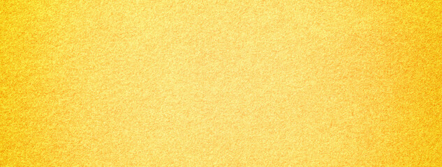 Texture yellow background from felt textile material with vignette, macro. Structure vintage golden fabric