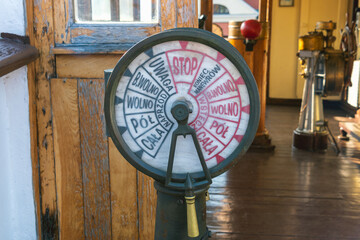 A vintage ship telegraph with Polish commands, located in the wheelhouse © bykot