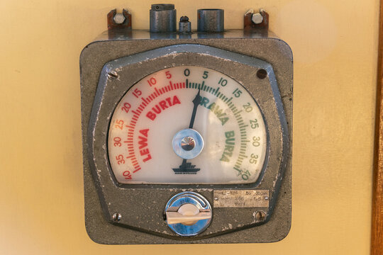 Vintage mechanical inclinometer with red and green indicators. Gdansk, Poland. Soldek