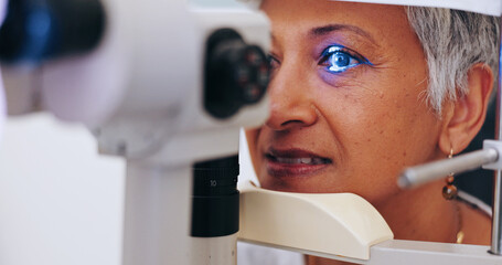 Eye exam, vision and light with old woman in clinic for optometrist, healthcare and consulting....