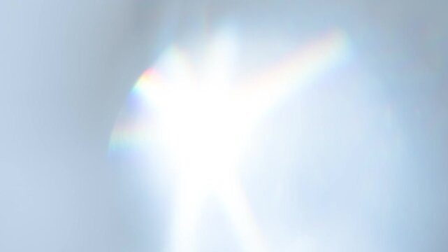 Iridescent Highlight Transformation. Loop. The light passes through the facets of a slowly rotating diamond and creates repetitive sparkling highlights and rainbow colors