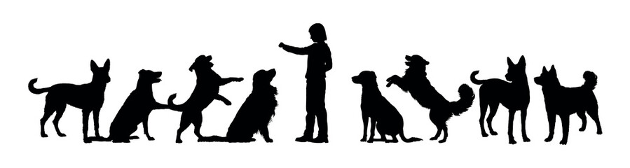 Boy playing with group of dogs side view vector silhouettes isolated on white background.
