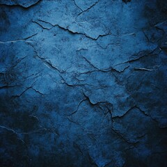Obraz premium A dark blue background featuring a distressed grunge texture design