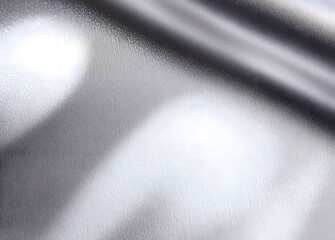 Gray shiny color paper background, smooth glowing shining silver aluminum texture, light wave