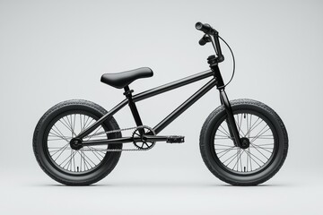 Fototapeta premium A black bike with a seat and a handlebar