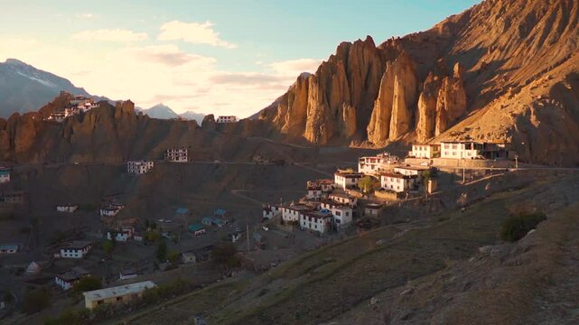 Landscape shot of Dhankar Monastery during the sunset at Dhankar in Spiti Valley, Himachal Pradesh, India. Village built on a cliff on the Himalayan mountain ranges in India. Old Monastery in Spiti. 