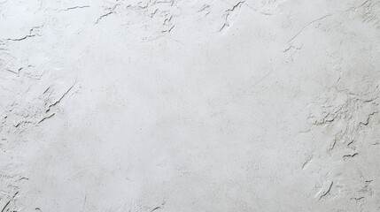 A textured, light gray surface resembling concrete or plaster, suitable for backgrounds.