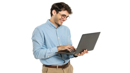 Confident young handsome businessman in blue shirt holding laptop and smiling at camera