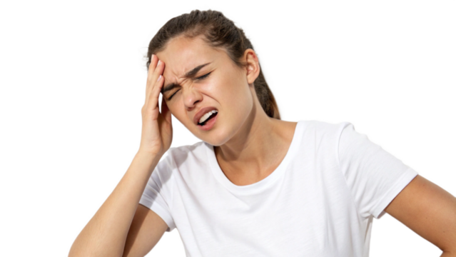 Young woman suffering from headache, head pain or migraine