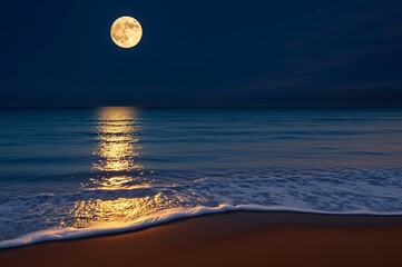 Obraz premium Serene Moonlit Beach at Night with Reflections on Calm Waters