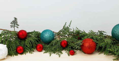 Creating a festive atmosphere  Christmas ornaments and thuja branches