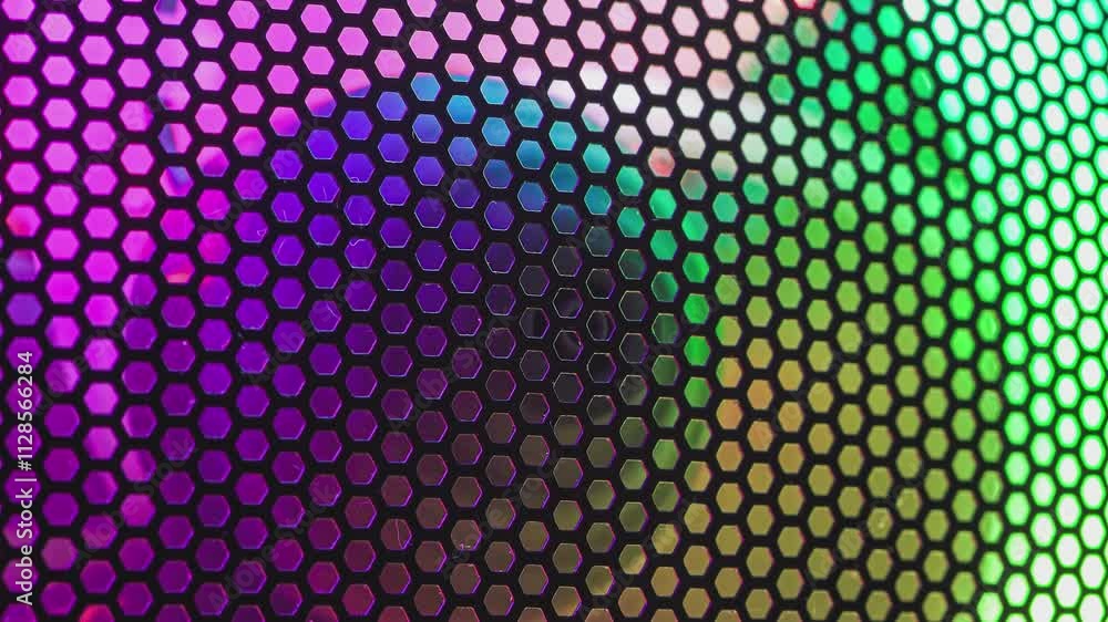 Poster rainbow light shifting behind hexagonal mesh