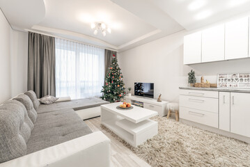 Cozy Modern Home Living Room Interior Decorated For Christmas With Tree and Holiday Ambiance. Luxury Style.