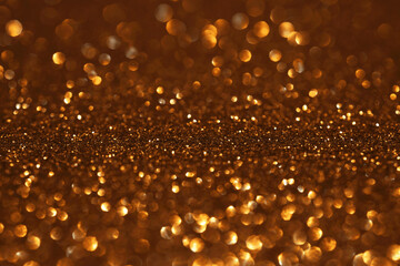 Golden glitter festive bokeh background