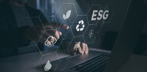 Man use a laptop to analyze ESG. Business investment strategy economy. Enviroment social governance